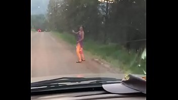Hitchhiker in the woods, gets banged over a tree for a ride back into town.