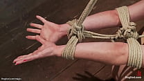 Bent redhead lesbian slave Jessi Palmer with ankles tied to spreader bar and hands tied together behind gets anal hooked then takes back arch suspension with ankles and wrists tied to the ground